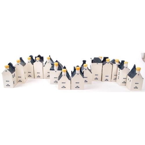 183 - KLM - BOLS - A collection of fourteen late 20th-century Blue Delft miniature liquor houses, sealed w... 