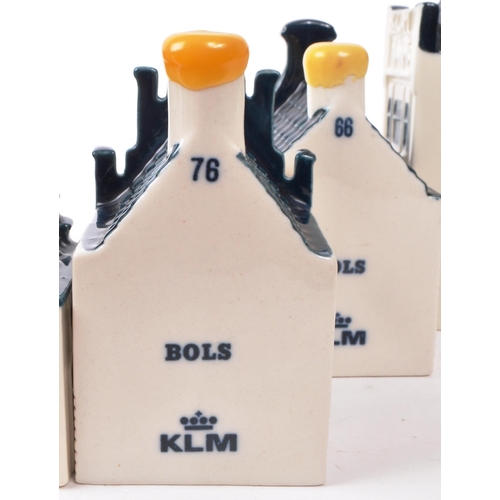 183 - KLM - BOLS - A collection of fourteen late 20th-century Blue Delft miniature liquor houses, sealed w... 