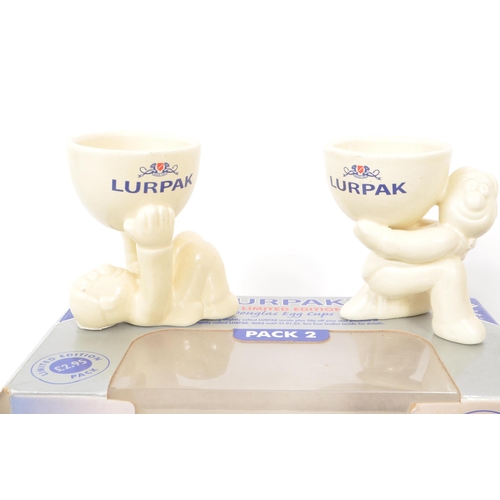 192 - Lurpak - A collection of vintage 20th century Lurpak ceramic egg cups. Each in original boxes, the c... 