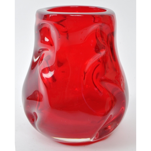 195 - A vintage mid-century Whitefriars 'knobbly' red art glass vase. Featuring an uneven, textured exteri... 