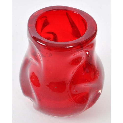 195 - A vintage mid-century Whitefriars 'knobbly' red art glass vase. Featuring an uneven, textured exteri... 