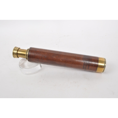 201 - A vintage 20th century brass 3-draw telescope, with leather covering to the handle. Measuring approx... 