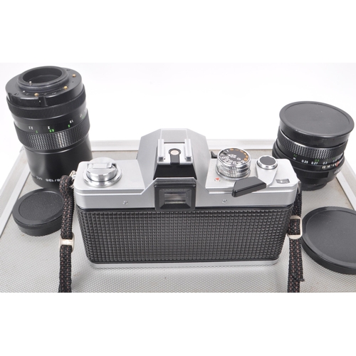 202 - 



A Praktica MTL3 Pentacon camera body together with lenses and in protective case along with acce... 