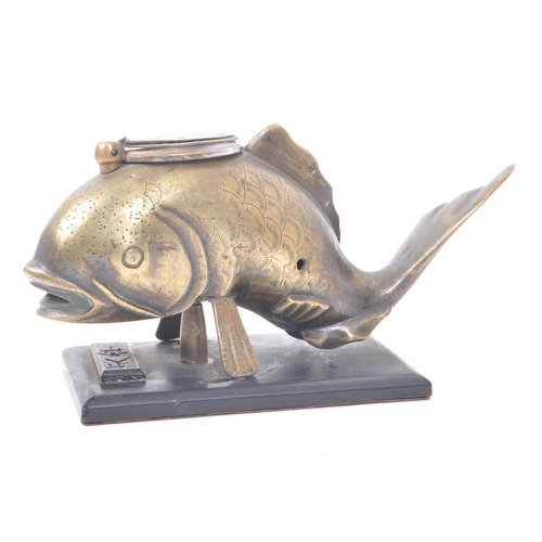 210 - An early 20th century Japanese brass inkwell, in the shape of a fish mounted on a wooden base. Inkwe... 