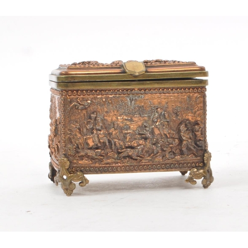 211 - A.B. Paris - A vintage 19th century copper relief jewellry box, with a blue velvet lining to the ins... 