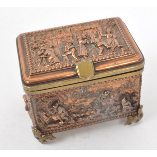 211 - A.B. Paris - A vintage 19th century copper relief jewellry box, with a blue velvet lining to the ins... 