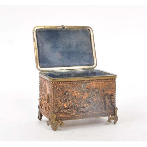 211 - A.B. Paris - A vintage 19th century copper relief jewellry box, with a blue velvet lining to the ins... 