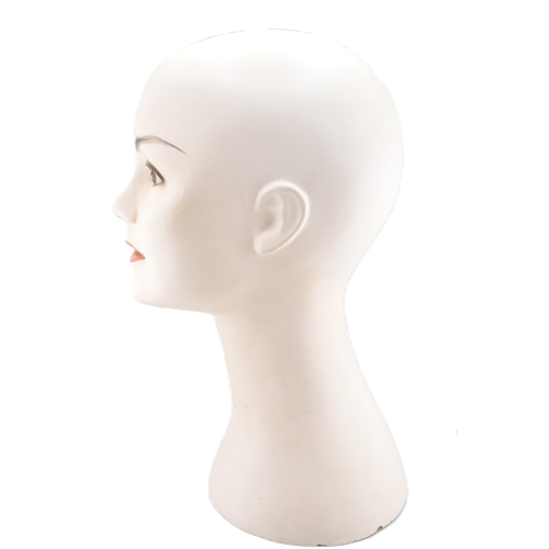 213A - An Art Deco shop display mannequin female head bust. Plaster construction with Deco style smokey eye... 