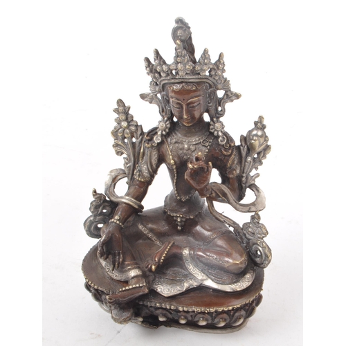 218 - A vintage 20th century bronze cast Buddha figure. Featuring silver toned decoration to the floral im... 