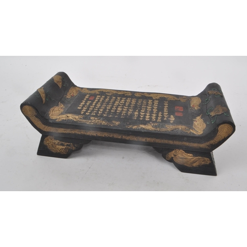 219 - A vintage 20th century Chinese pillow / writing table. Featuring a black stone base, and hand-painte... 