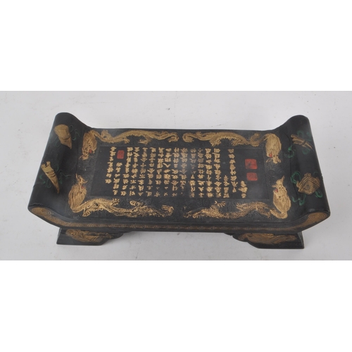 219 - A vintage 20th century Chinese pillow / writing table. Featuring a black stone base, and hand-painte... 