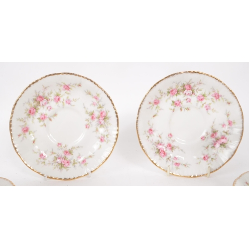 22 - Paragon - Victoriana Rose - A collection of late 20th century fine bone china six tea cups and sauce... 