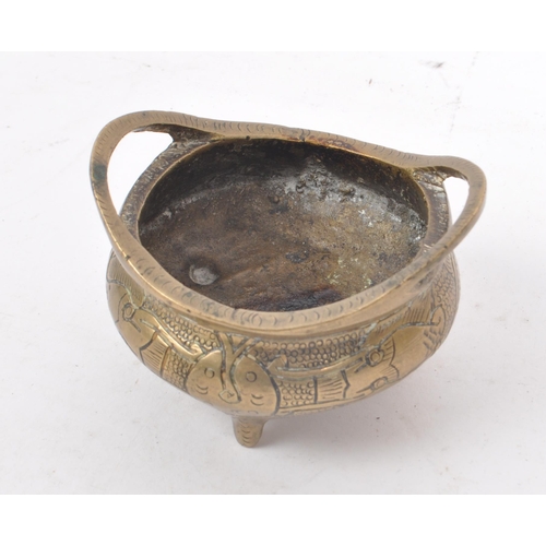 224 - A late 19th century Chinese brass censer / scent bowl. Featuring a carved dragon design to the body,... 