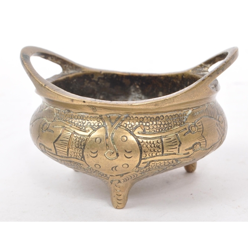 224 - A late 19th century Chinese brass censer / scent bowl. Featuring a carved dragon design to the body,... 