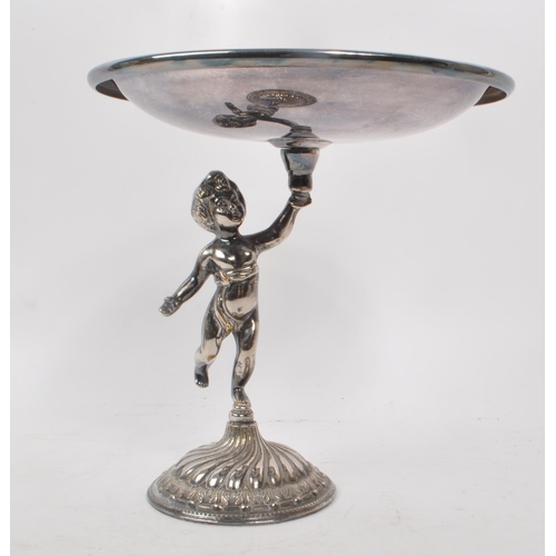 231 - A 20th century silver plated putti tazza, alongside a gilt brass cast stag figure. The tazza raised ... 