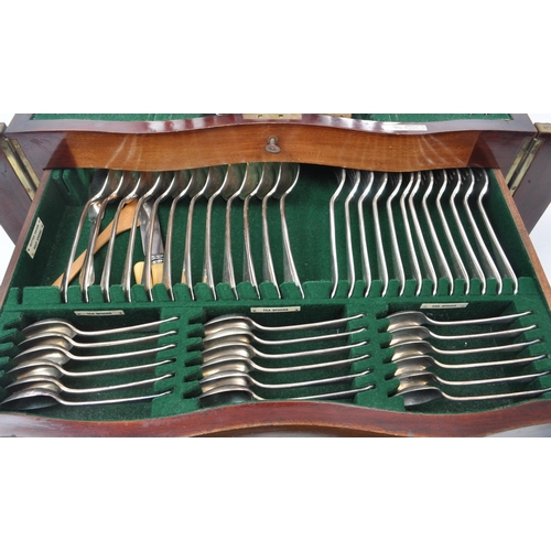 239 - Walker & Hall Ltd - An early 20th century silver plate cutlery canteen, boxed with twin drawers.... 