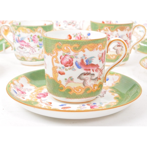 24 - Minton - Green Cockatrice - A 20th century English part tea service, comprising of five tea cups and... 