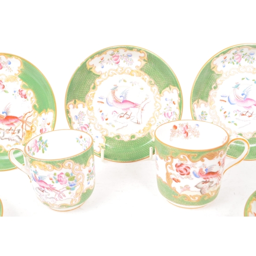 24 - Minton - Green Cockatrice - A 20th century English part tea service, comprising of five tea cups and... 