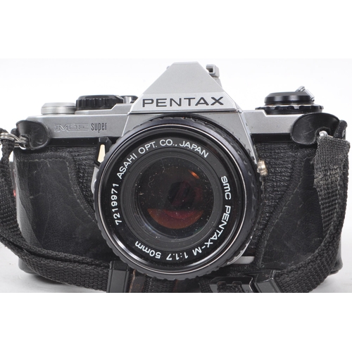 242 - Pentax - A collection of three late 20th century cameras comprising of: two Petax ME Super cameras, ... 