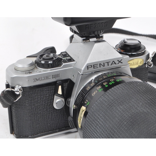 242 - Pentax - A collection of three late 20th century cameras comprising of: two Petax ME Super cameras, ... 