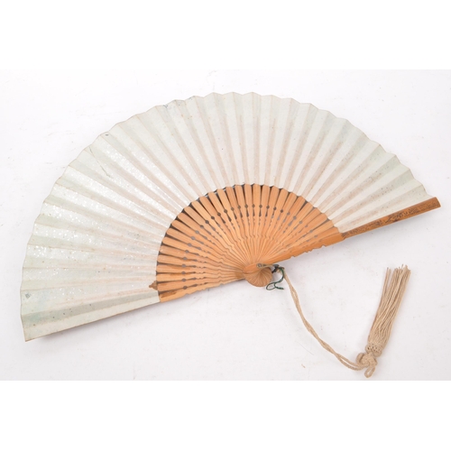 244 - Two vintage early 20th century fans, both comprised of wooden frames and paper fan, decorated in flo... 