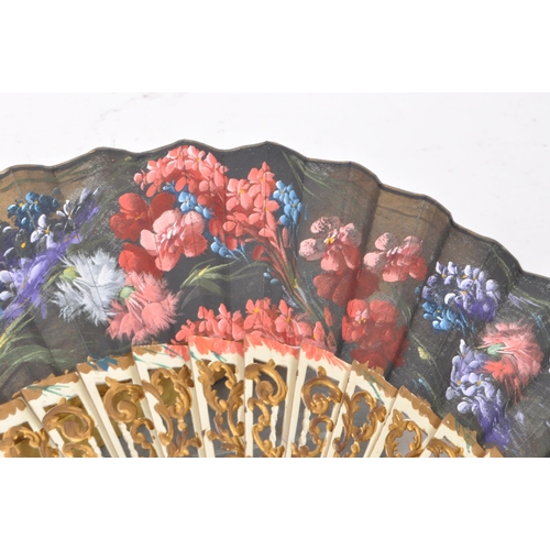 244 - Two vintage early 20th century fans, both comprised of wooden frames and paper fan, decorated in flo... 