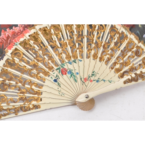 244 - Two vintage early 20th century fans, both comprised of wooden frames and paper fan, decorated in flo... 