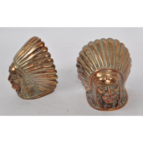 248 - Two vintage 20th century brass Native American book ends, both in the shape of a man's head wearing ... 