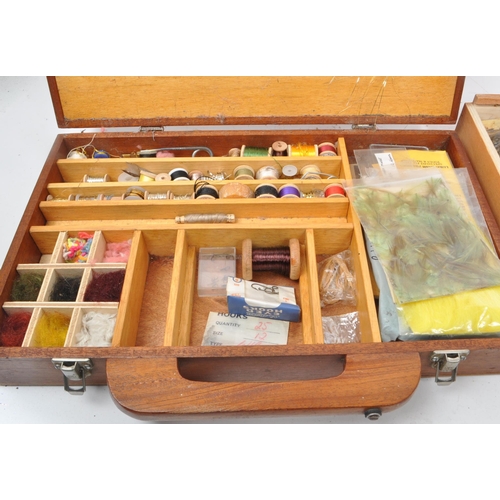 250 - Fishing Interest - A collection of vintage 20th century fishing flies and equipment. Two boxes with ... 