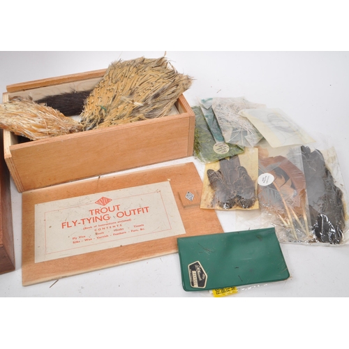 250 - Fishing Interest - A collection of vintage 20th century fishing flies and equipment. Two boxes with ... 