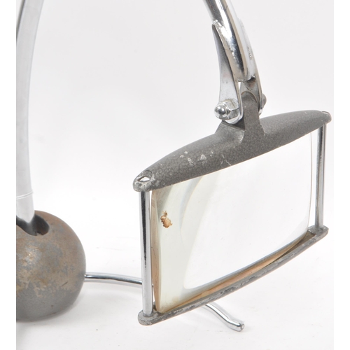 256 - A metal table top magnifying glass by Enbeeco from approx.1930s-1940s. Spherical weighted base with ... 