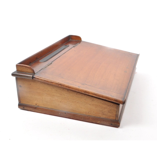 257 - A 19th century mahogany writing slope / desk tidy with hinged opening to reveal unlined compartments... 