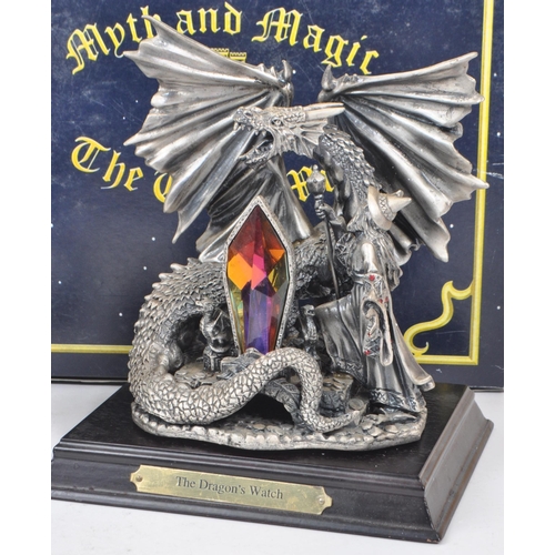 265 - Myth & Magic by The Tudor Mint - Four modern cast pewter statue dragon figurines. To include The... 