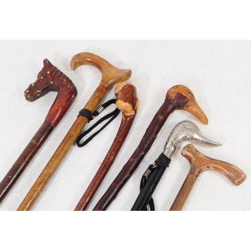 268 - Collection of vintage 20th century hand made walking sticks / swagger canes. Including wooden horse ... 