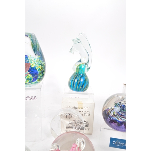 27 - Large collection of glass paperweights, to include brands such as Caithness, Dartington, Mdina and o... 