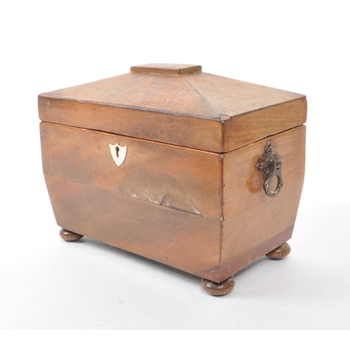 273 - A late 19th century walnut tea caddy. Featuring two tea compartments with two lids and two small bon... 