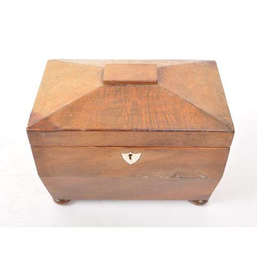 273 - A late 19th century walnut tea caddy. Featuring two tea compartments with two lids and two small bon... 