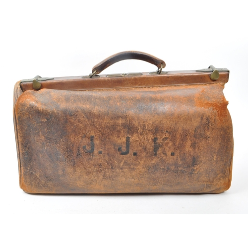 275 - A victorian 19th century leather doctors / travelling bag. Featuring brass hinges, studs to the bott... 