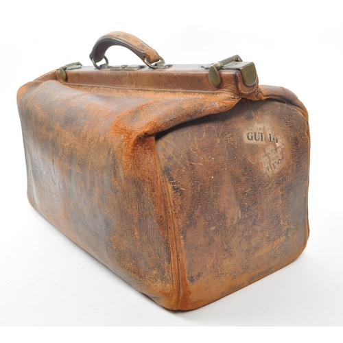 275 - A victorian 19th century leather doctors / travelling bag. Featuring brass hinges, studs to the bott... 