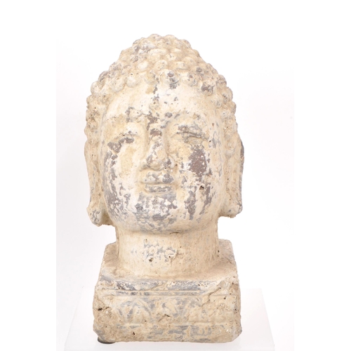 276 - A collection of four bust stone figure heads, from varing periods. Comprising of: a stone cast buddh... 