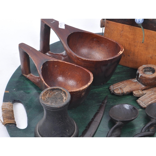 278 - Collection of African Tribal carved wooden pieces, comprising of: two kuksa style cups, two knives, ... 