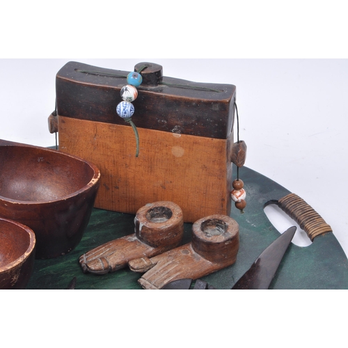 278 - Collection of African Tribal carved wooden pieces, comprising of: two kuksa style cups, two knives, ... 