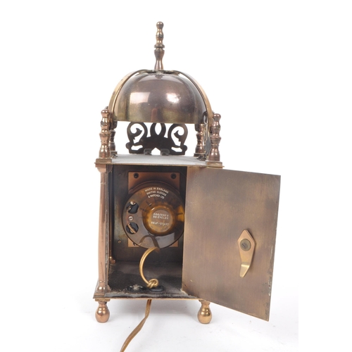 285 - Smiths - A mid century electric brass Smiths lantern clock. Domed top with gilt face and ebonised Ro... 