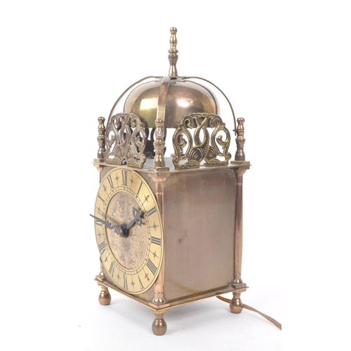 285 - Smiths - A mid century electric brass Smiths lantern clock. Domed top with gilt face and ebonised Ro... 