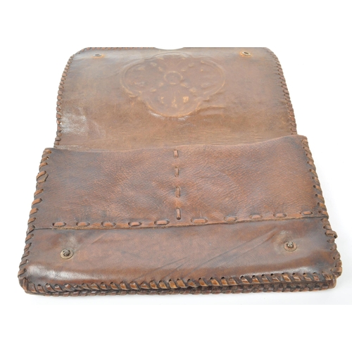 290 - A collection of five vintage 20th century leather and suede wallets. Featuring one with snake skin p... 