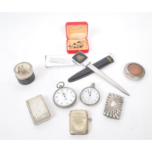 303 - A collection of 20th century metal travel pocket items. The collection to include two pocket watches... 