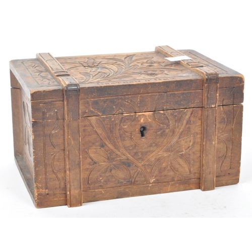 305 - A carved hardwood souvenir box lined with red imitation suede. Swiss in origin, carved with an edelw... 