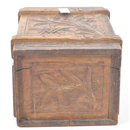 305 - A carved hardwood souvenir box lined with red imitation suede. Swiss in origin, carved with an edelw... 