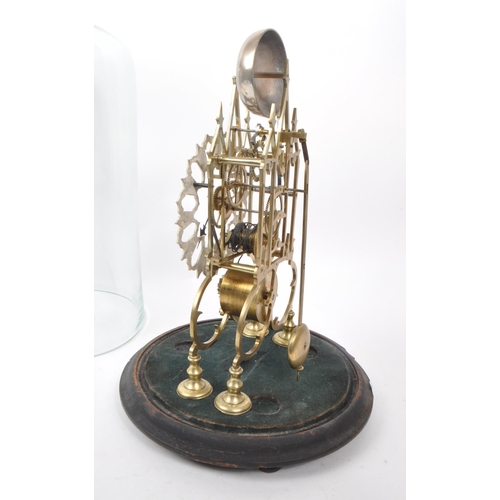 307 - A domed skeleton timepiece with wooden base. Gothic style brass metalwork with hand painted face and... 