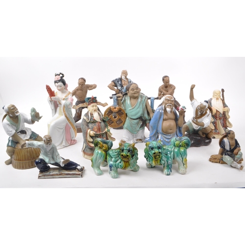 31 - Large collection of Chinese figurines, mostly comprising of mud men, action figures, female figures ... 